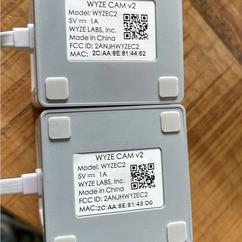 2 Wyze Indoor Wi‑Fi Cameras in White and Black